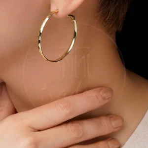 گوشواره حلقه‌ای طلایی با تراش چندوجهی براق | مینیمال، سبک و شیک