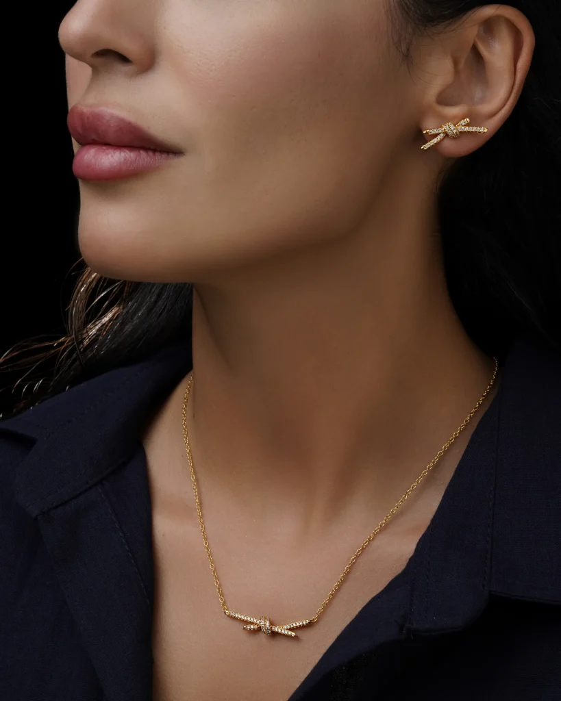نیم ست زنانه طلایی طرح روبان کریستالی
