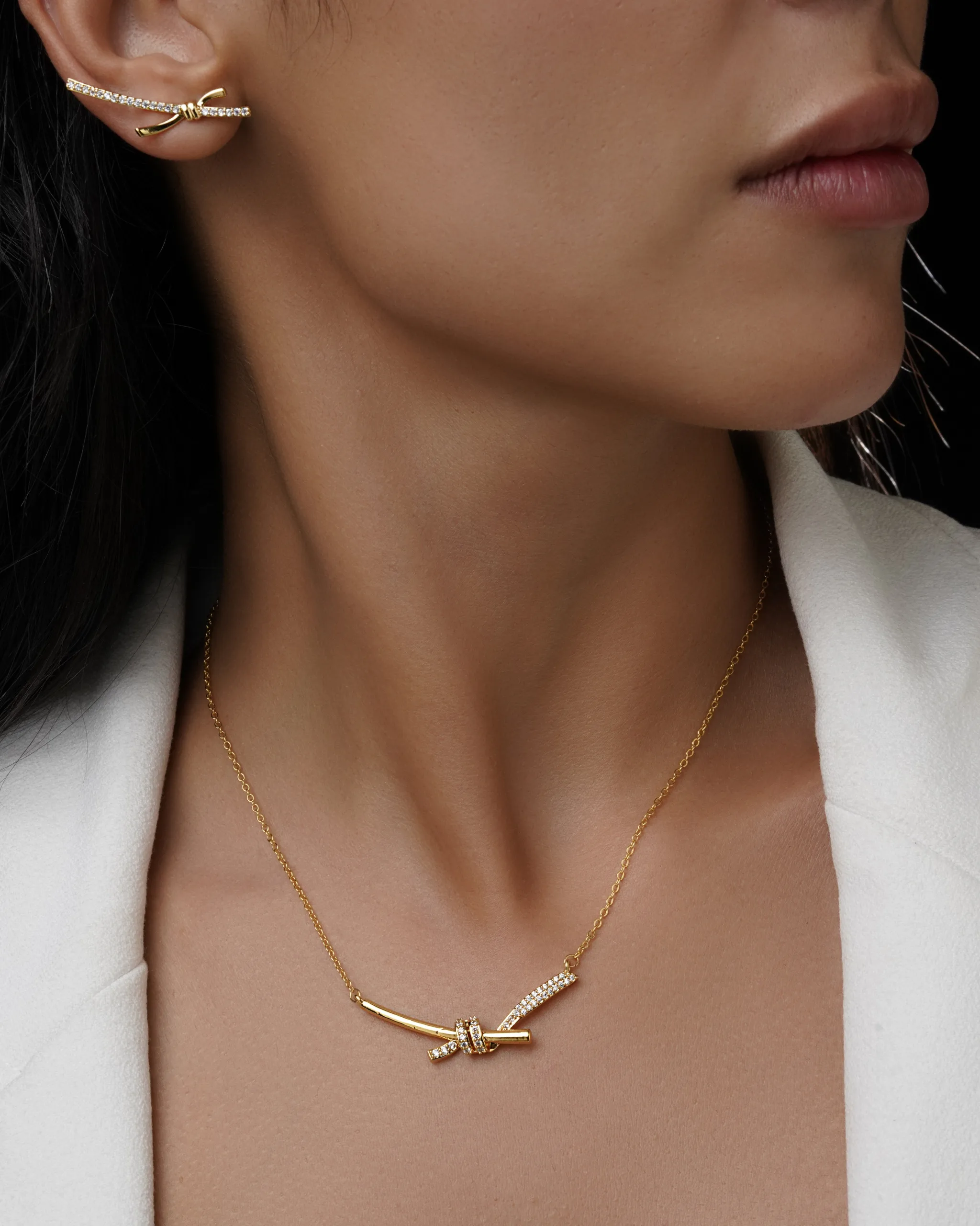 نیم ست زنانه طلایی مدل نات (Knot)